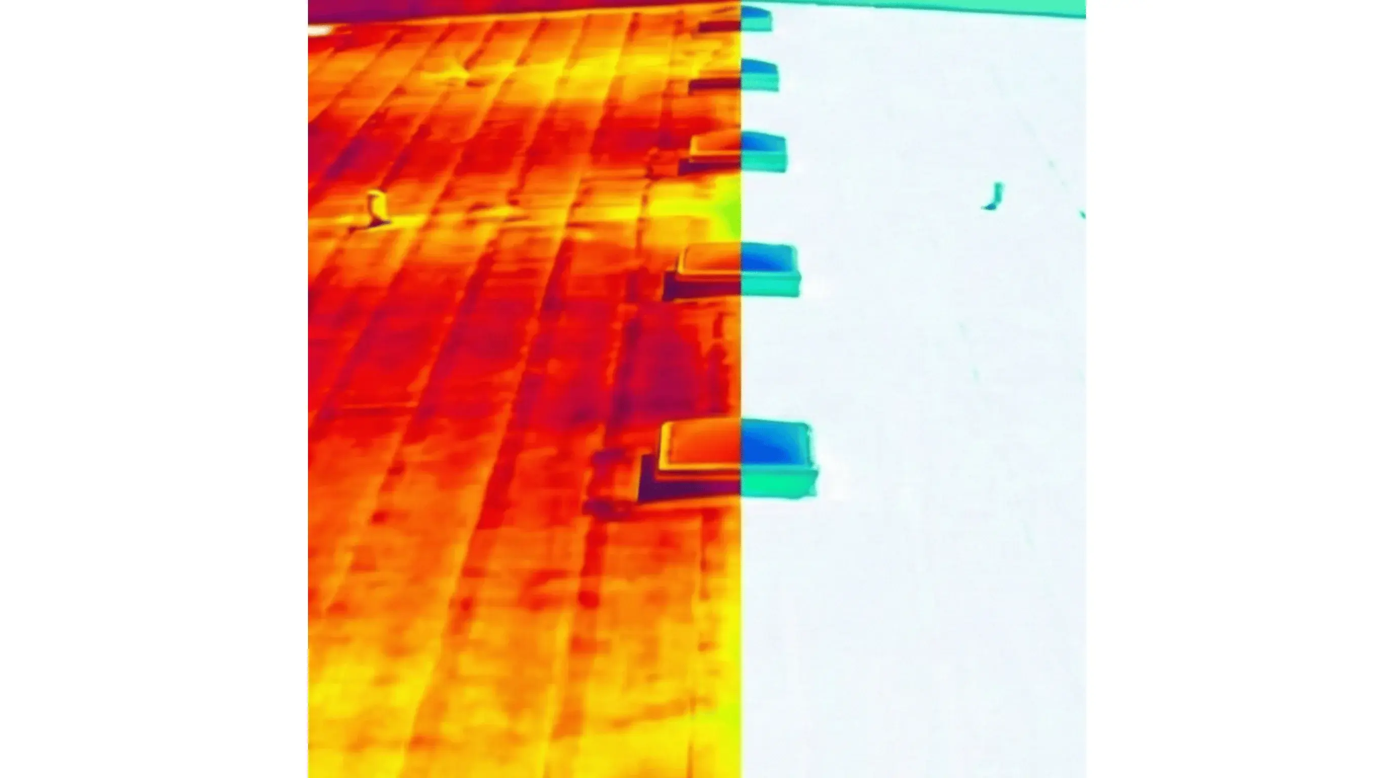 Infrared comparison showing temperature reduction on a cool roof coating versus a dark uncoated roof surface.
